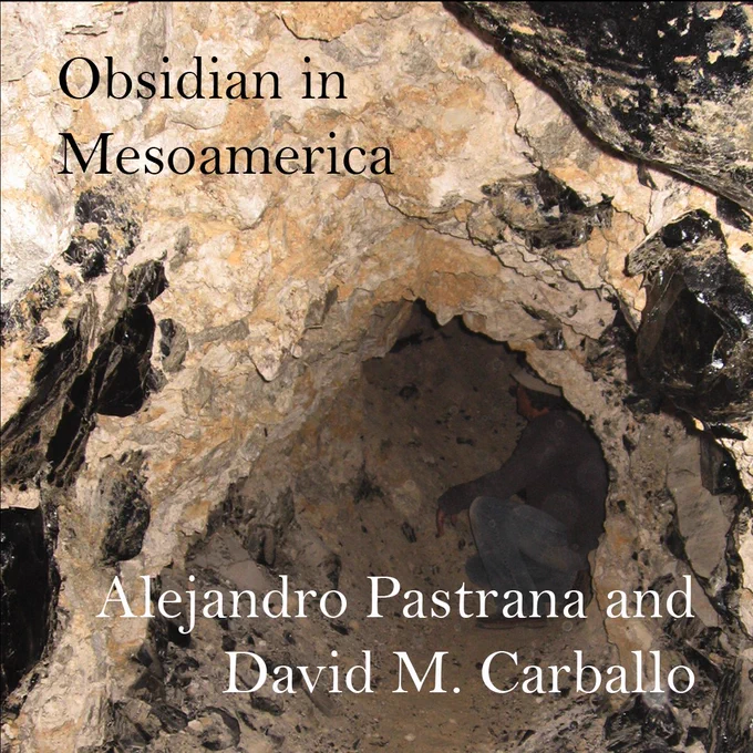 Man inside a dirt tunnel with chunks of obsidian protruding with the text “Obsidian in Mesoamerica Alejandro Pastrana and David M. Carballo”
