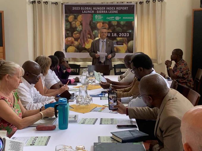 German Ambassador to Sierra Leone Jens Kraus-Massé (standing in the back in front of the official launching banner) addressing the audience from NGOs & development partners at the launch of Global Hunger Index Report 2023 on 18 April 2023 at the German Residence in Freetown.

(c) German Embassy