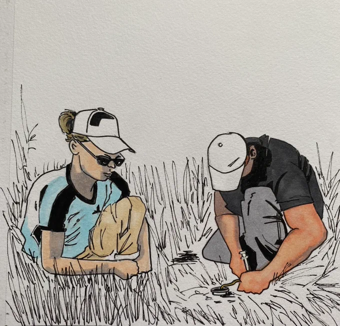 Researchers collecting soil gas measurements. 