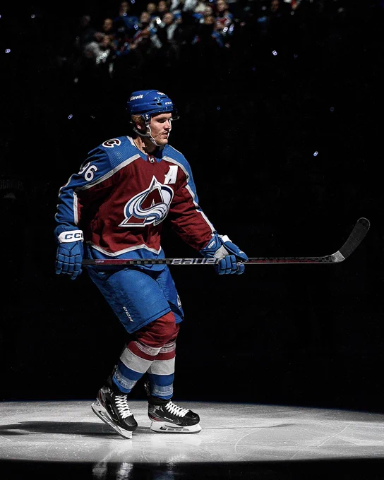 Mikko Rantanen skating on the ice in avalanche home jersey at Ball Arena