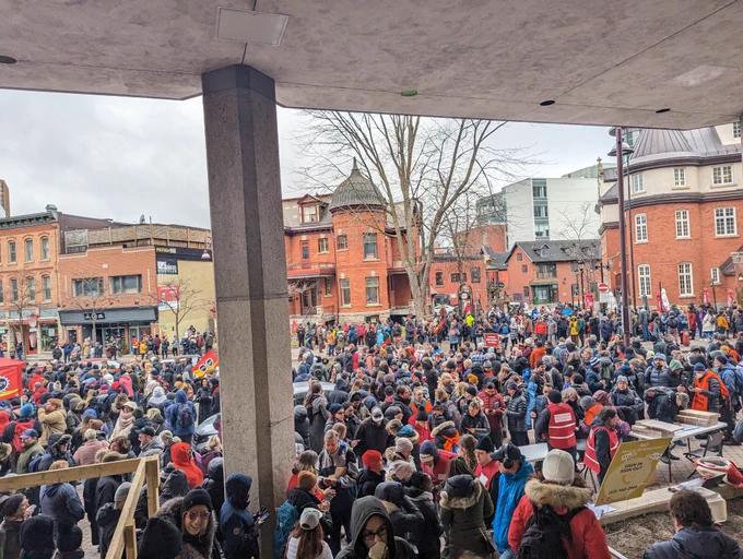 Crowd of people on strike at Place du Centre 