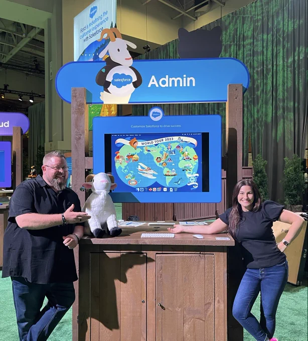 Mike Gerholdt and Lisa Dick in front of the Admin demo booth at Salesforce World Tour Washington D.C.