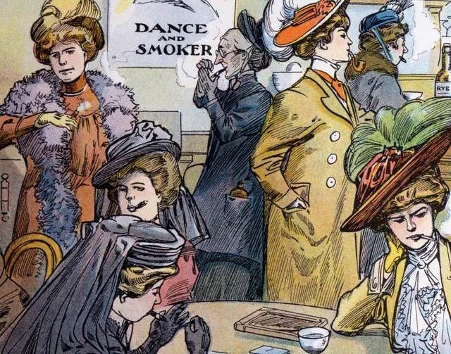A group of well-dressed women sit around a table smoking cigarettes.