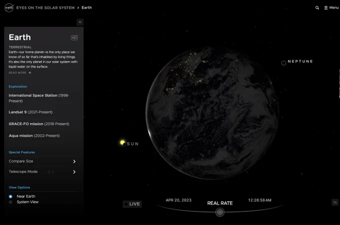 Screenshot of a web application that displays the current positions of the planets. It shows a view of the night side of Earth and the Americas. To the left of Earth, the Moon can be seen about to pass in front of the Sun.