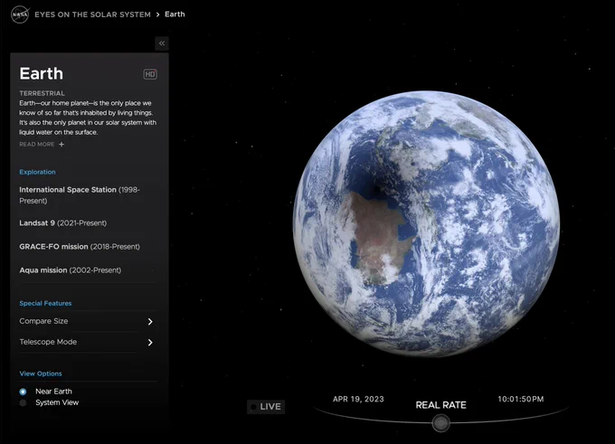 Screenshot of a web application that displays the current positions of the planets. The day side of Earth and Australia are visible. Over a portion of Australia falls a shadowed area.
