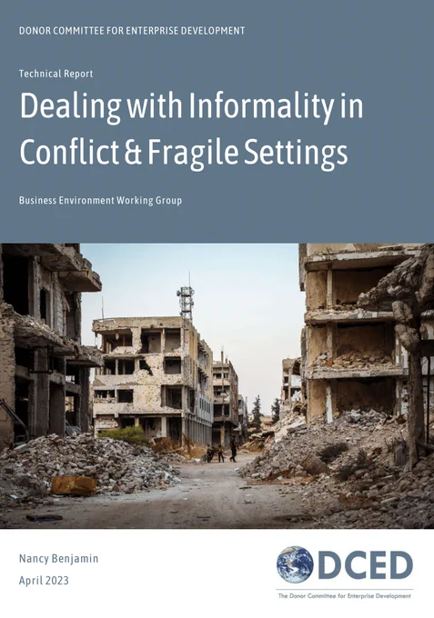 Cover page of the report including title and background image of a war-town city