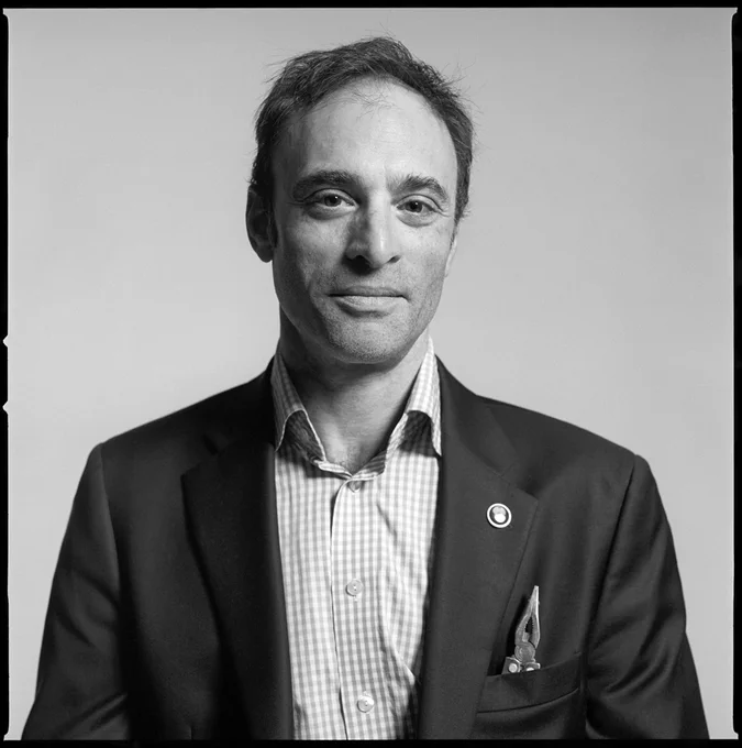 Black and white portrait of Sheperd Doeleman.