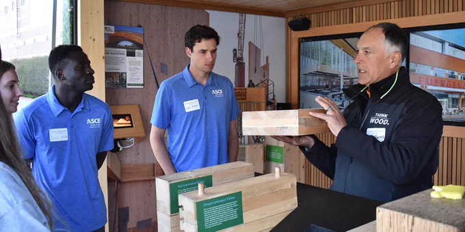 Civil Engineering students listen to Think Wood's Bruce Burns explain different types of mass timber construction methods.