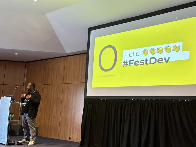 Romulo on the stage of Fest.dev