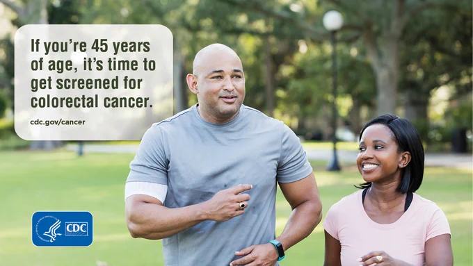 Couple in their early 40's jogging outside. Text: If you're 45 years of age, it's time to get screened for colorectal cancer.