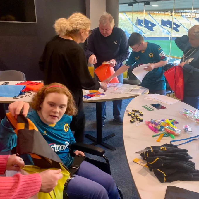 Members of Wolves Disabled Supporters Association (DSA) preparing comfort packs.