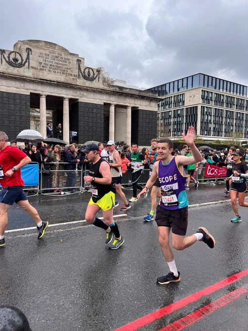 Scope runner waving as he passes our cheer point.