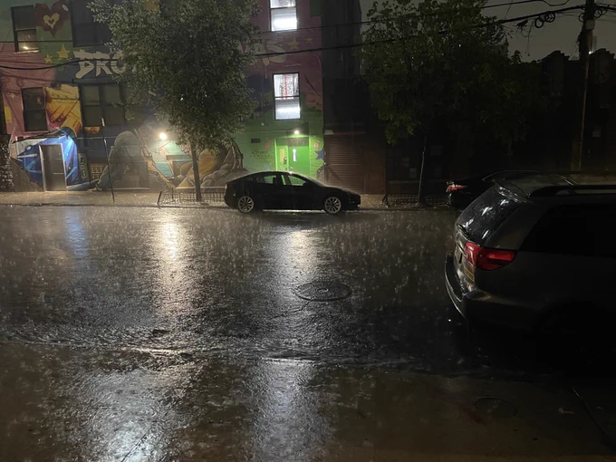 photograph >> monsoon rains spring cleansing torrents in the streets of the south Bronx >> Philip M Shearer >> 2023-04-22 >> MetaBronx
