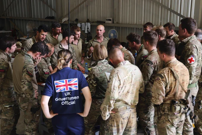 Briefing to group of armed forces and a UK government official.