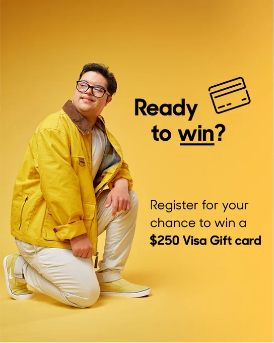 A man is crouched down wearing a bright yellow jacket. There is text next to him that reads "Ready to win?"