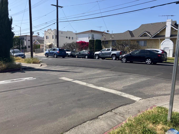 A half-erased crosswalk at Fountain and Kenmore.