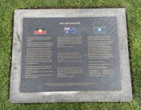 Plaque telling the story of the For Our Country memorial