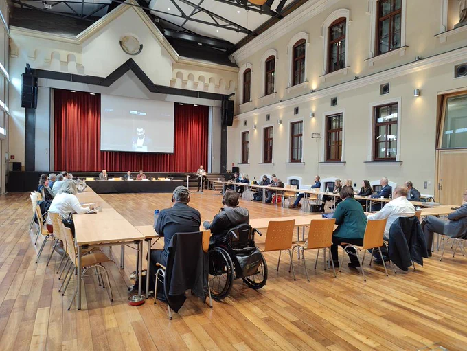 Picture of conference participants discussing public procurement & employment of persons with disabilities