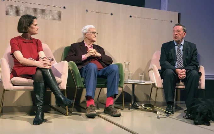 Rachel Sylvester, Lord Baker and Lord Blunkett seated on stage in the Great Room of RSA House