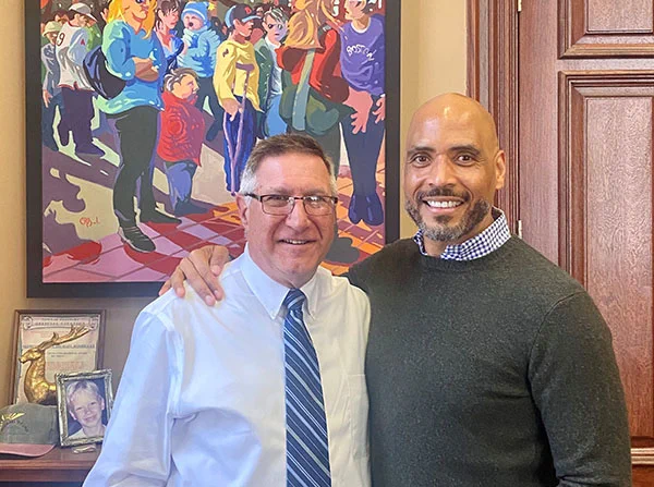photo of Senator Rodrigues standing with Michael J. Bobbitt