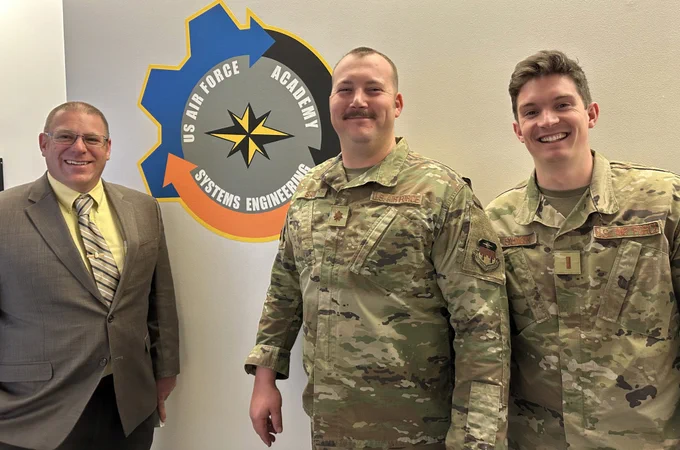 U.S. Air Force veteran Jeremy Daily (left), associate professor, Colorado State University Department of Systems Engineering, visits with Maj. Martin “Trae” Span, PhD student, CSU Systems, and 2nd Lt. Gabe Salinger, master’s student, CSU Systems, following a guest lecture Daily gave at the U.S. Air Force Academy.