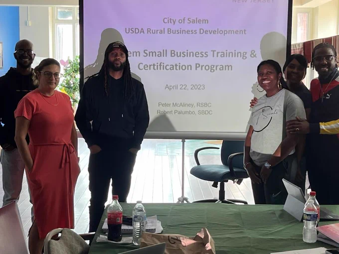 Our program in partnership with the NJ SBDC at Rutgers-Camden, have launched its “Small Business Training and Certification Program” to a cohort of black entrepreneurs in Salem, NJ. 🌳 💼 

The cohort, funded by a grant that the City of Salem received from the USDA to encourage minority entrepreneurship in rural areas, combines the strength of the short-term requirements of starting a business that the NJ SBDC at Rutgers-Camden provides with the long-term tools on leadership, positioning, and sustainability that Rutgers School of Business–Camden provides. 🙌✔

The three-month #hybridprogram culminates with a project that consists of an initial business plan and a “elevator pitch” that these entrepreneurs can employ to secure financing, establish strategic partnerships, and hire a workforce that will support their success! 📊 📲 
-
#njbusiness #salemnj #usdaruralbusinessdevelopment #njsbdc #rutgerscamden #peerrutgers #hybridwork #acrossnewjersey 