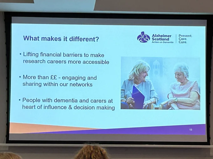Information about how the MRes scheme reduces barriers to research and is undertaken in collaboration with people with dementia and families.