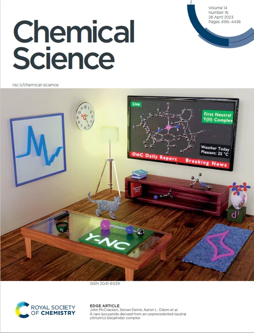 The image depicts a living room theme where the TV displays a structure of a low valent yttrium(II) complex as breaking news on OmC news channel.The wall has a painting that shows the electron paramagnetic resonance (EPR) of a metal radical, while a floor rug with CV design adds an elegant touch.The flower vase features d-orbital shaped flowers with "d1" written on the box. Two starting materials, trimethylacetonitrile and t-butyl isocyanide, are lying on
the wooden rack below the TV, and they react with the molecule on the TV to give Yttrium isocyanide. The final product is neatly arranged on a coffee table in the form of a jigsaw puzzle. Several books on organometallic chemistry are lying around, and the clock shows a temperature of 25 degrees Celsius at which the molecule is stable. A coffee mug with the initials of the artist/student and a cute cat lounging in the room add a homey vibe