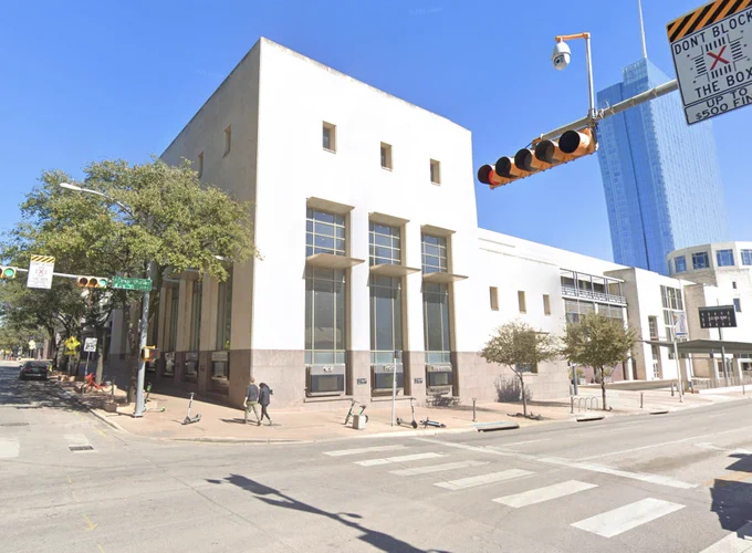 A corner view of the Austin Convention Center from the street.