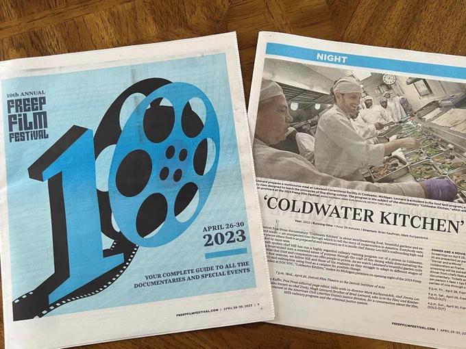 Newspaper clipping of the Freep Film Festival and a review of the film Coldwater Kitchen