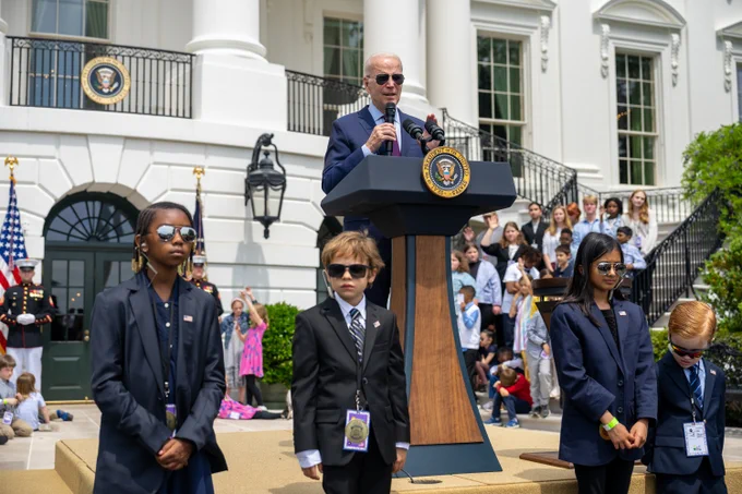 President Biden delivers remarks. White House staffers' children are dressed as Secret Service agents.