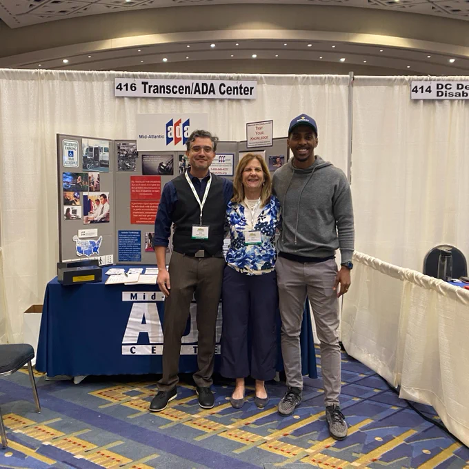 Photo of Maynor, Ann, and Johnny at ADA Center booth at the GWHCC Expo 