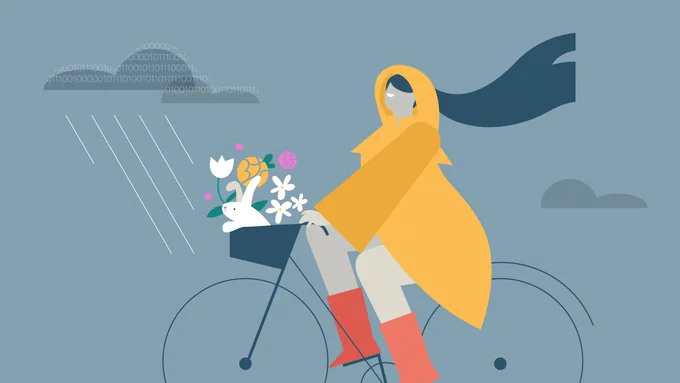 person on a bike with flowers