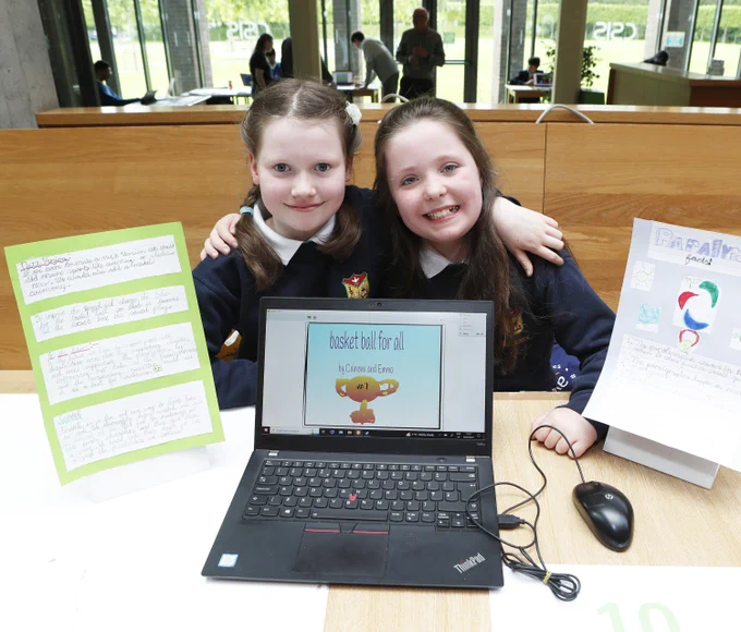 Emma O'Reilly(9) and Caireann Ó Maonaigh(10) from Kidsizedcomputing, Clontarf with their project at the Scratch National Finals 2023.