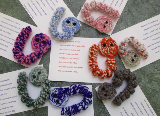 photo of knitted worms