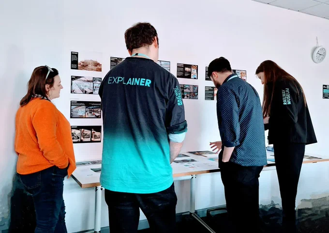 Four people from the teams involved with the Railway Museum in a drop-in session discussing the project.