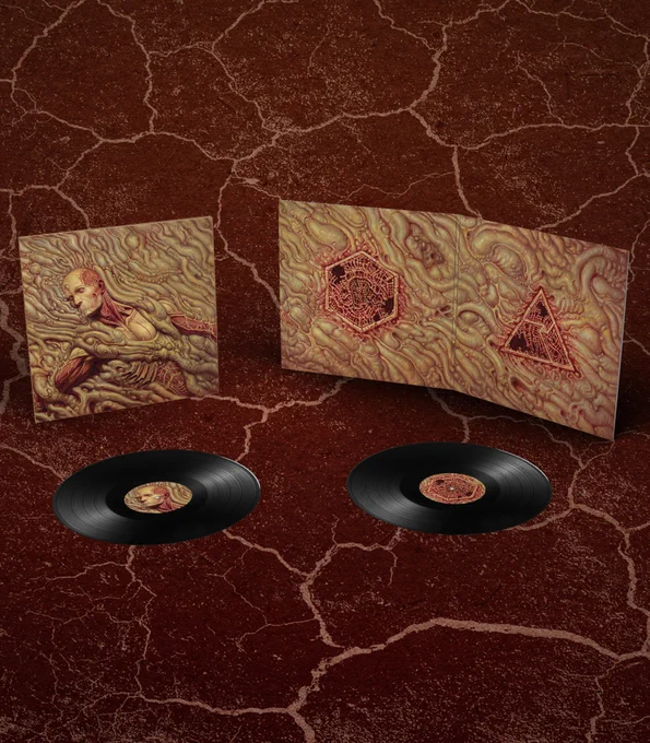 The Scorn vinyl with black discs and artwork depicting a flow of intestinal matter and iconography from the game