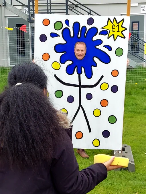 BHASVIC's Principal gets ready to receive a sponge to the face at the 2023 leaver's event