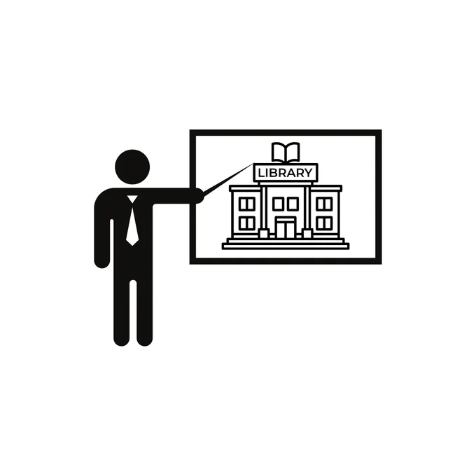 A stick figure wearing a tie uses a pointer to gesture to a sketch of a library on a chalkboard.