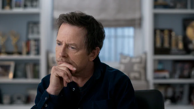 Michael J. Fox is picture looking off screen during the documentary, STILL: A Michael J. Fox Movie. 