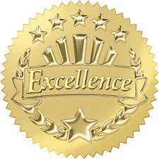 Round gold badge with "Excellence" engraved upon it, surrounded by a wreath of stars.

