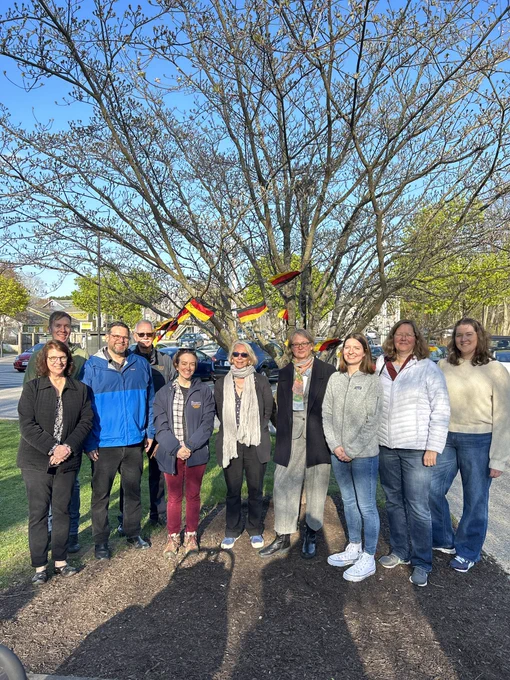 A group photo with members of faculty and staff associated with the URI German department. There are 10 people pictured.