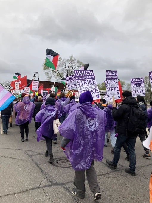 Grad Workers marching in street
