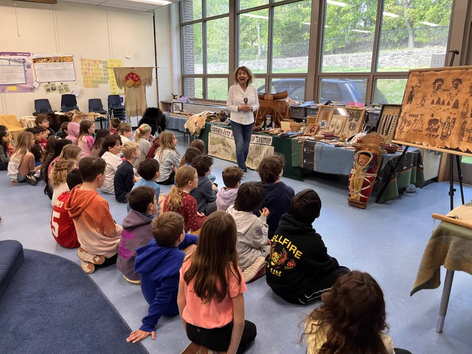 Third grade students listening attentively to the Journeys Into American Indian Territory speaker. 