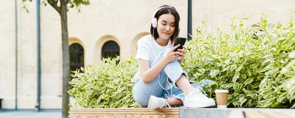Woman reading from her phone