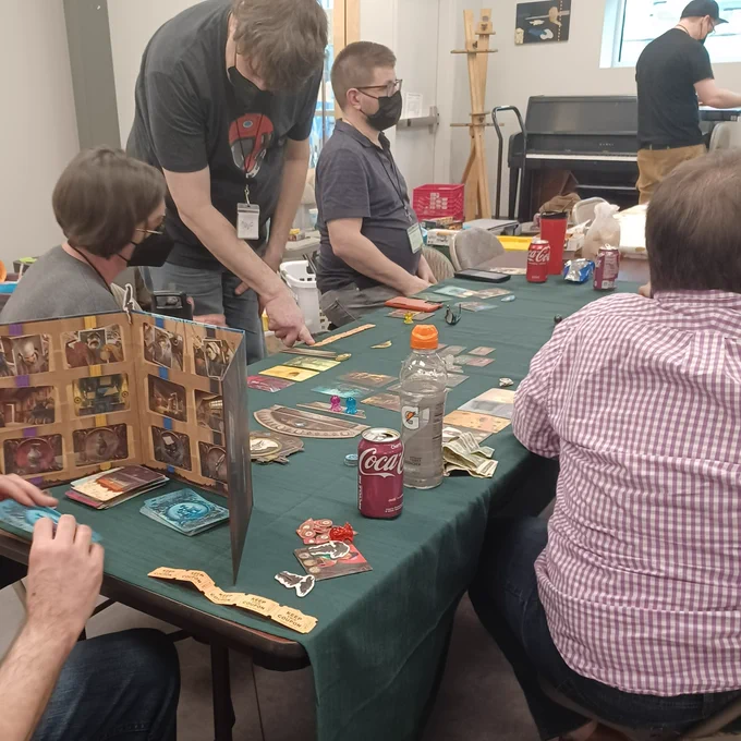 Several people play a board game