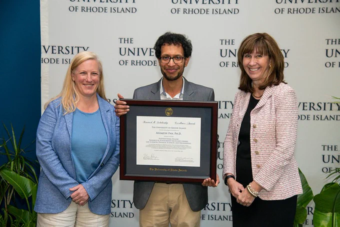 Dr. Animesh Pan (Postdoctoral Fellow Research and Scholarship Excellence Award Life Sciences, Physical Sciences, and Engineering) poses with VP of Research Bethany Jenkins and Provost Barbara Wolfe