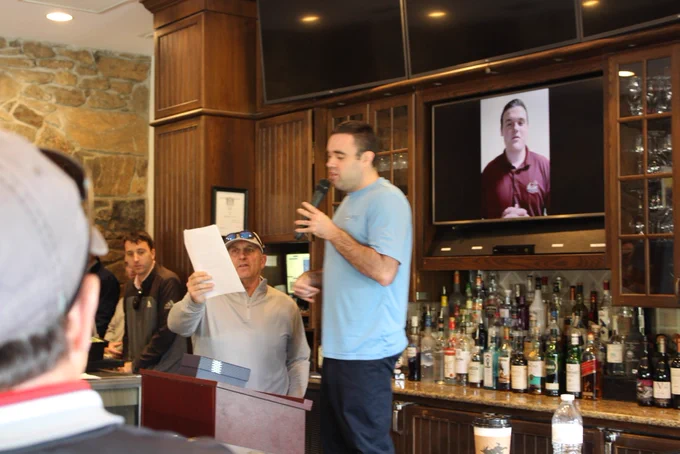 Artie with his son Ethan at the Drive for Autism. Ethan is giving a speech during the opening program.