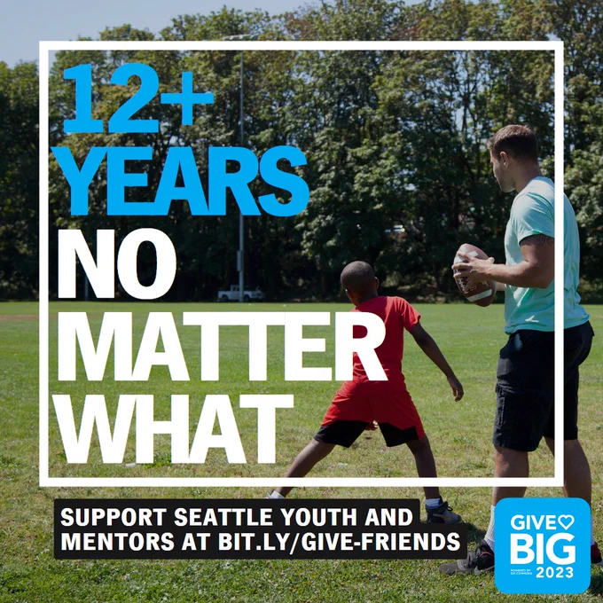 Elementary-aged male-presenting youth with dark skin, black hair, and a red-shirt practices football, back towards the camera. In a white border, a blue and white caption reads, "12  years no matter what" in all caps. Below the box reads, "Support Seattle youth and mentors at bit.ly/give-friends" in all caps. A GiveBIG 2023 logo is at the bottom right.