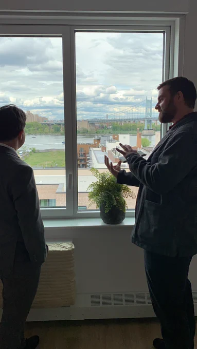 Department of City Planning Director Dan Garodnick speaks with City Planning's Queens Deputy Director Jonathan Keller about the 100% affordable development at 3-24 27th Avenue in Astoria, while touring one of its apartments. 